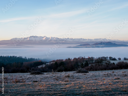 Landscape in the morning. There is fog in the valley. View of the Tatra Mountains from the Pieniny Mountain Range © AM Boro