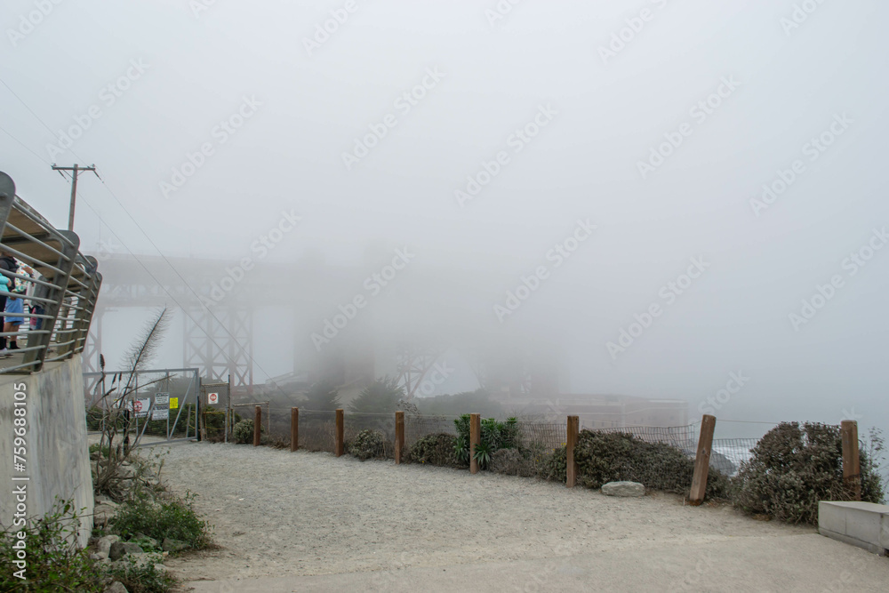 View of Golden Gate bridge hidden completely by fog