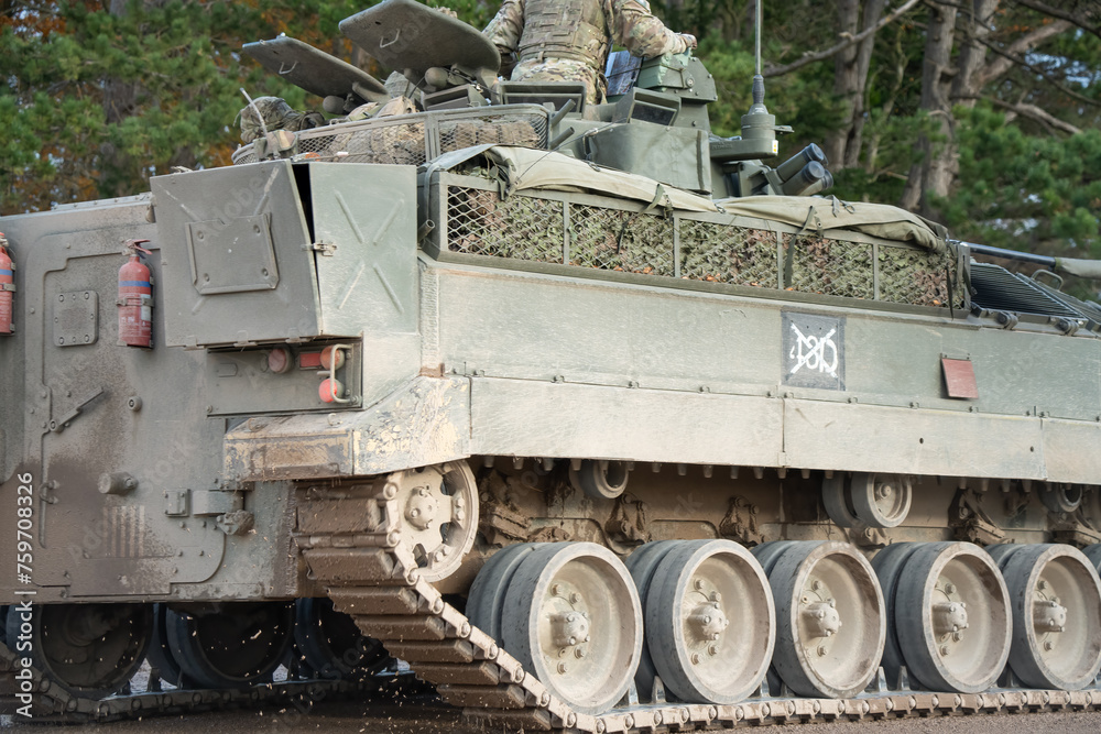 close-up of a British army Warrior FV510 Infantry Fighting Vehicle in action on a military exercise