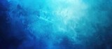 Beautiful blue gradient background with noise. Texture suitable for various projects and presentations.