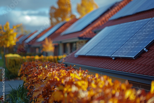 A row of houses featuring solar panels installed on their roofs photo