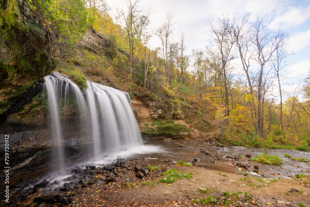 Fototapeta premium waterfall in autumn, fall colors