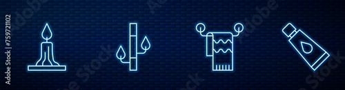 Set line Towel on hanger, Burning candle, Bamboo and Cream or lotion cosmetic tube. Glowing neon icon on brick wall. Vector