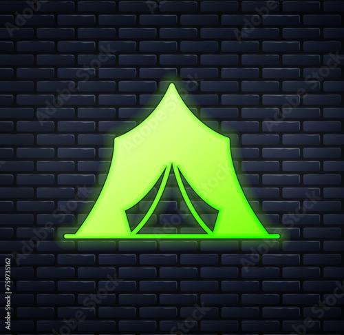 Glowing neon Circus tent icon isolated on brick wall background. Carnival camping tent. Amusement park. Vector