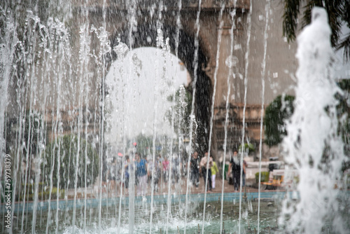 View of the fountain water against the gate in the square