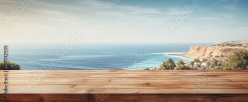 wooden table with a blurry ocean view