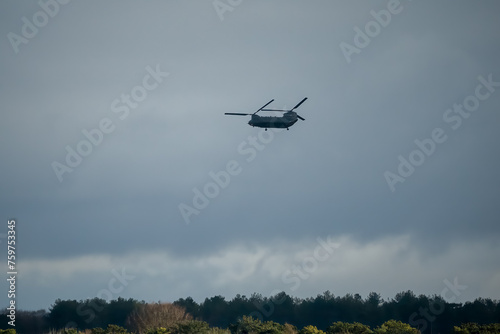 British army Chinook helicopter in low level military action, Wilts UK