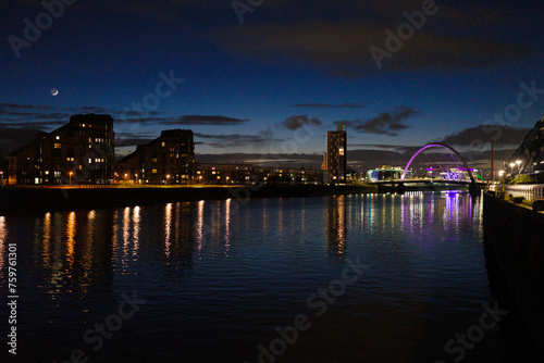 Glasgow Scotland: 11th Feb 2024: The Clyde Arc illuminated at night on the Banks of the River Clyde aka the Squinty Bridge