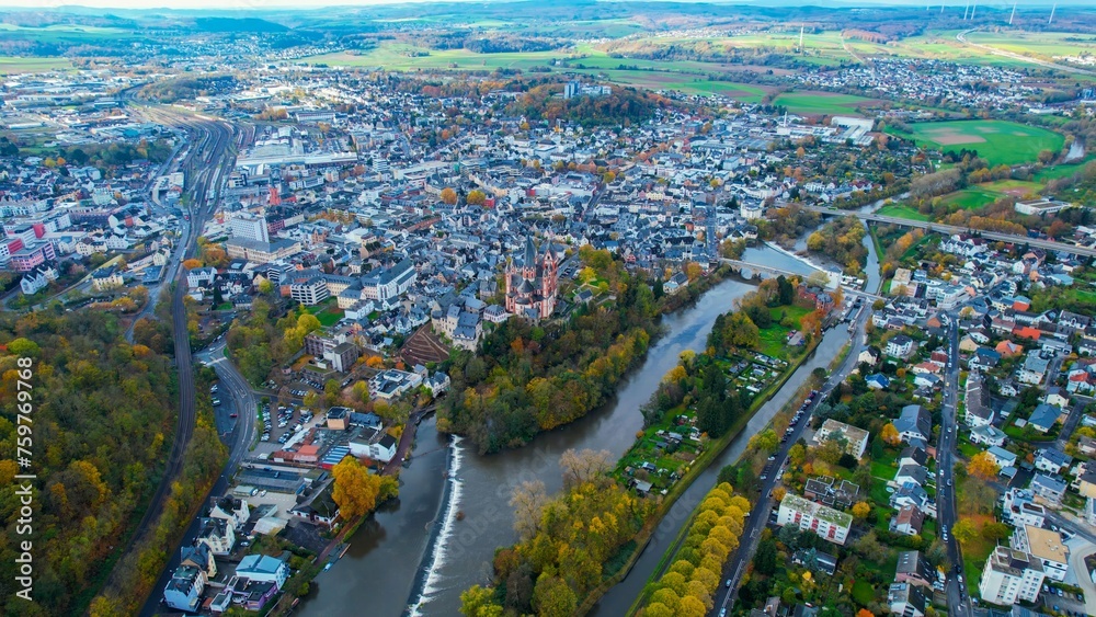 Aerial view of the old town and castle Limburg in Germany on a cloudy noon in autumn	
