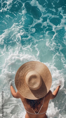 Summer vibe woman in hat by ocean