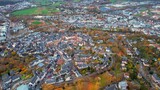 Aerial of the old town around the city Wetzlar in Germany on a cloudy noon in fall
