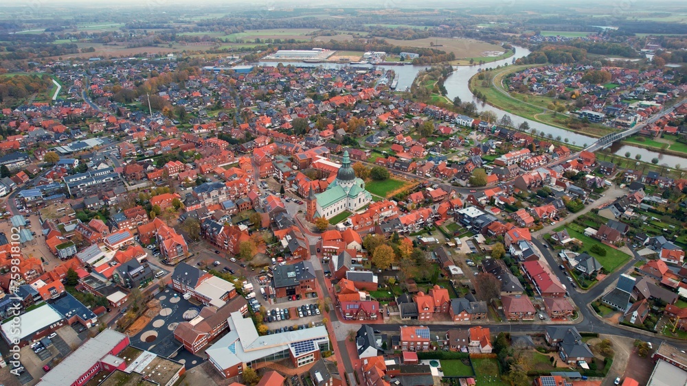 Aerial view of the old town around the city Haren on an overcast day in fall in Germany.	