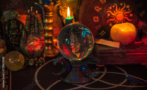Bilde på lerret Table with candles and esoteric stuff