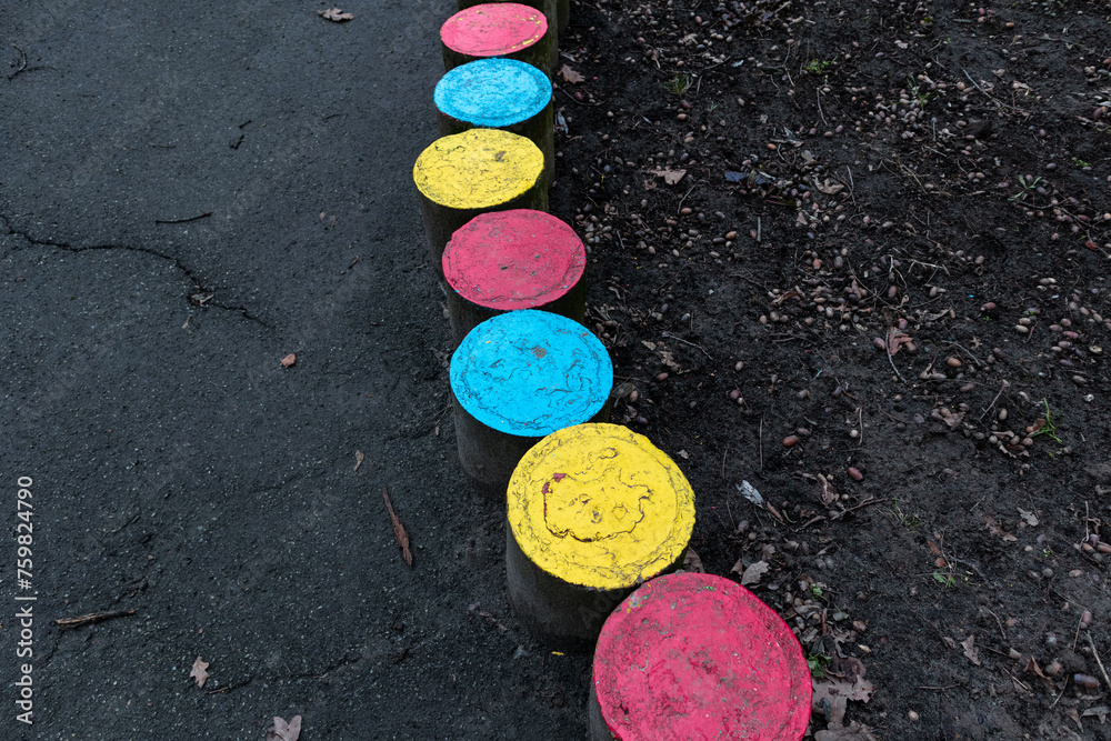 Children's multi-colored round steps on the playground Children's multi-colored round steps on the playground
