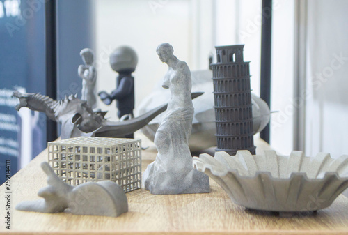 Many different art models from polyamide powder printed on 3D printer. Technology Multi Jet Fusion MJF. Three-dimensional model printed 3D printer from plastic. Additive progressive powder technology