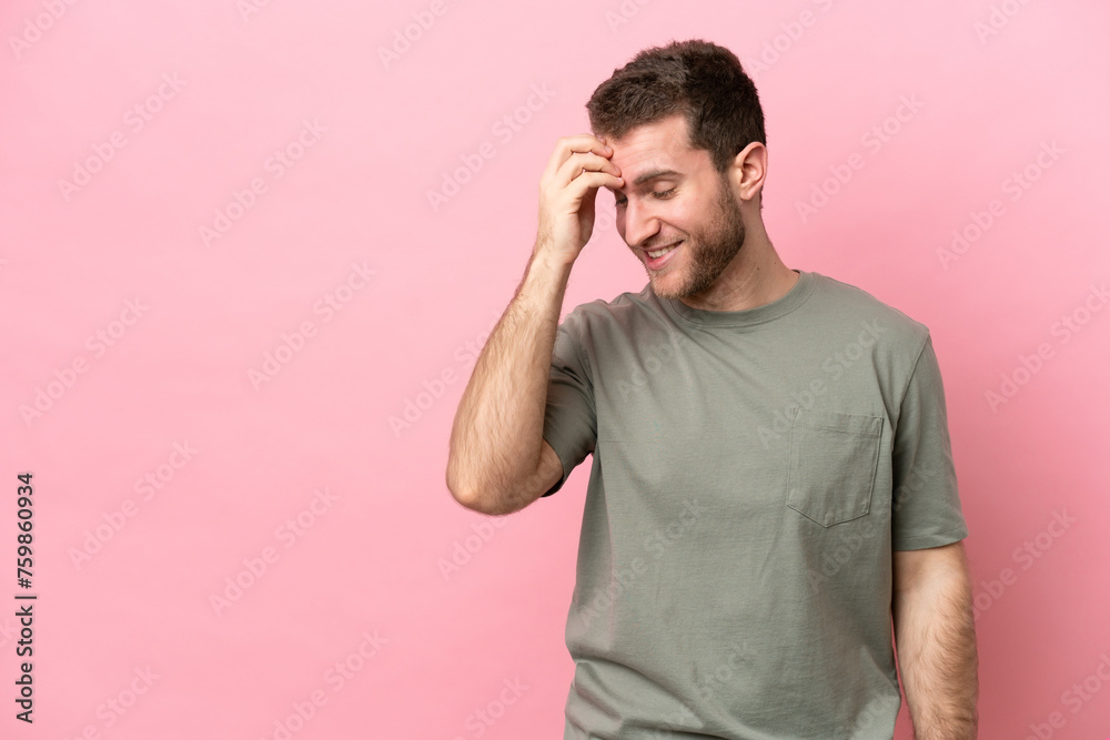 Young caucasian man isolated on pink background laughing Young caucasian man isolated on pink background laughing