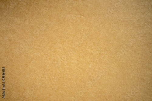 A large-size photograph of a cardboard sheet of paper. A blank cardboard sheet for the text.The texture of old paper.