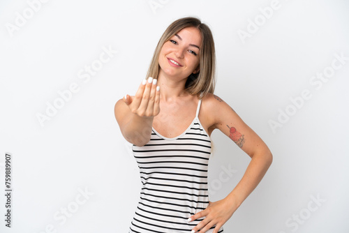 Young Romanian woman isolated on white background inviting to come with hand. Happy that you came