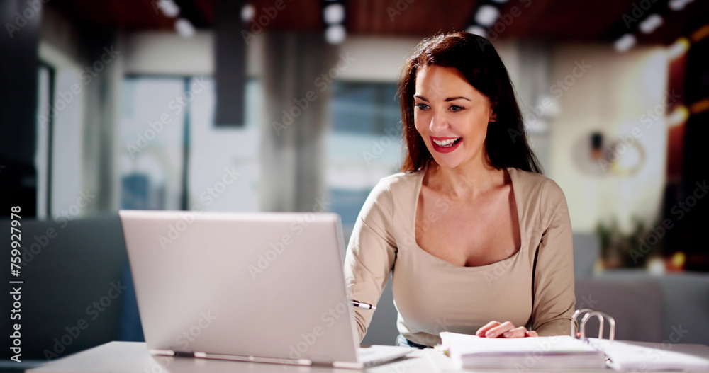 Women Calculating Finance Online On Couch Women Calculating Finance Online On Couch