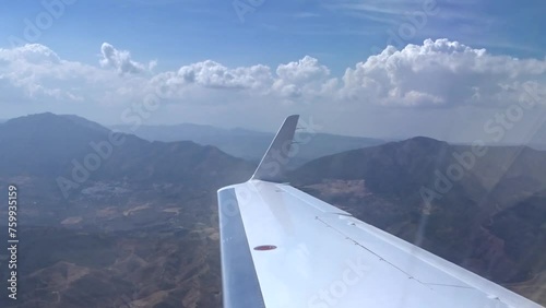 Airplane Window View Mountains Sand Green Real Footage photo