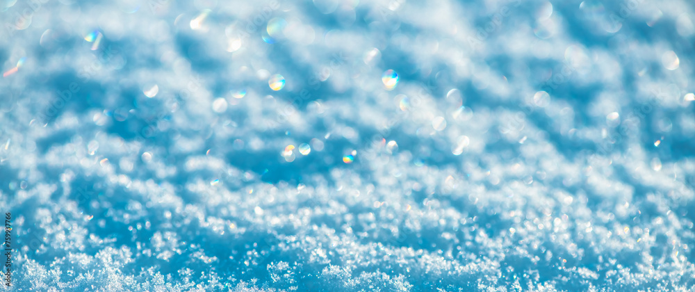 Natural snow background, snow glitters and shimmers like a rainbow in the sun, natural snow texture