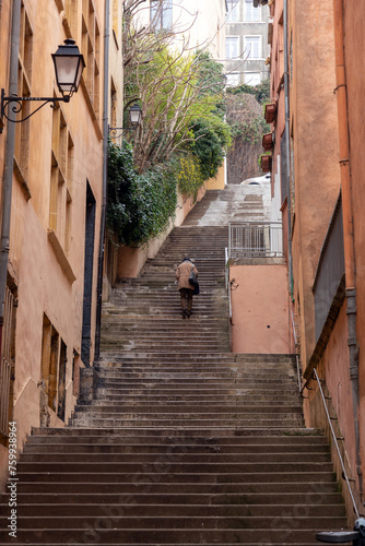 Fototapeta Naklejka Na Ścianę i Meble -  Hilly streets with steps in Lyon, Rhone Alps, France