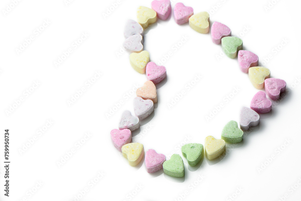 Obraz premium Pink and purple heart shaped candies. Valentine's day background. 6