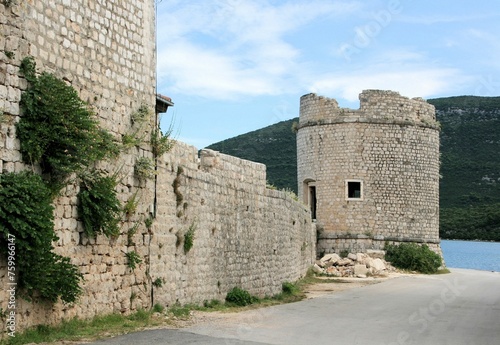 Wall and tower of an old fortress in Mali Ston, Peljesac, Croatia © Susy