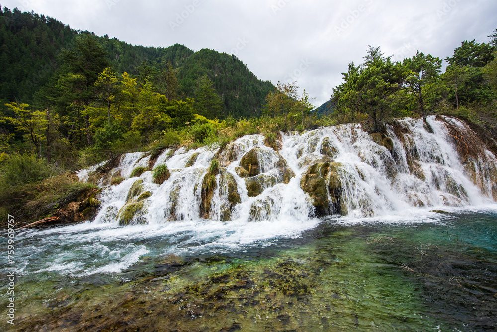 Mountain lake waterfall in Jiuzhaigou, Sichuan, China