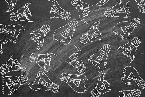 Set of broken down light bulbs hand drawn on a blackboard. Uninspired or motivation, burnout or exhausted from crisis, no new idea or inspiration concept.