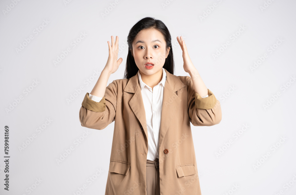 Portrait of young Asian businesswoman posing on white background Portrait of young Asian businesswoman posing on white background