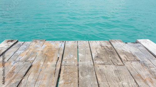 Serene wooden dock on calm lake, ideal for text placement and peaceful contemplation