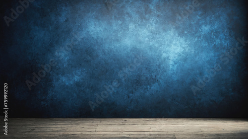 Dark blue grunge wall texture background.