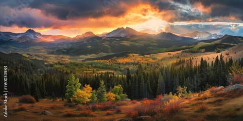 sunset illuminating an expansive valley and mountain range in autumn © Raanan