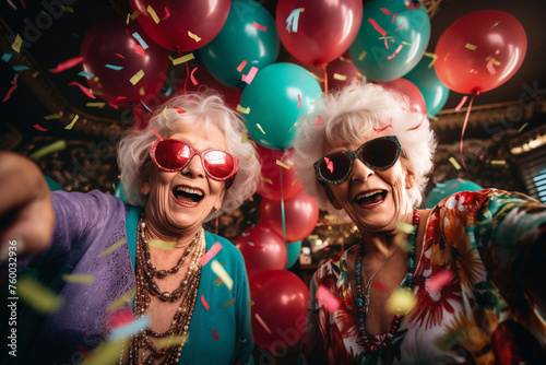 Cheerful old ladies partying	