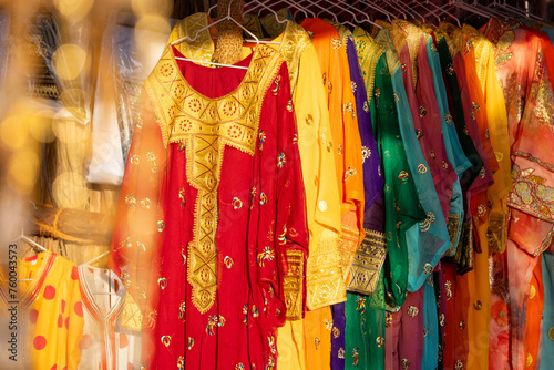Variety of traditional Emirati style dresses displayed in the market in Abu Dhabi