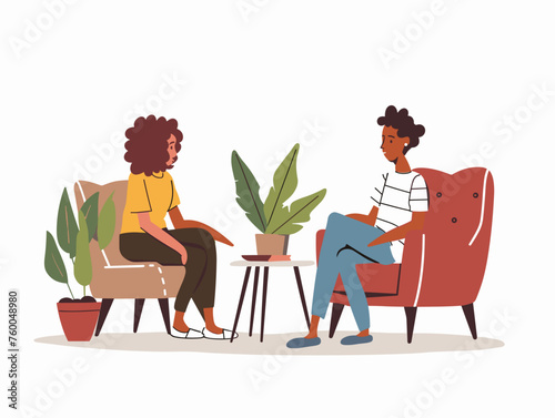  A person sits comfortably with a therapist discussing their feelings and working through challenges in a safe and supportive environment. 