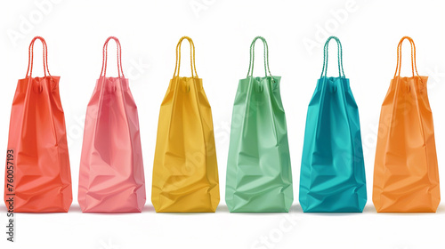 colorful paper shopping bags isolated on white.