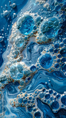 Close up of electric blue liquid with bubbles resembling wind waves on water