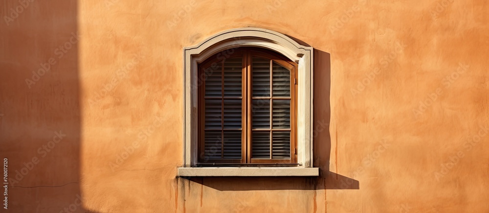 A rectangular brown wood window fixture is embedded in the brickwork of the building, stained with tints and shades of wood