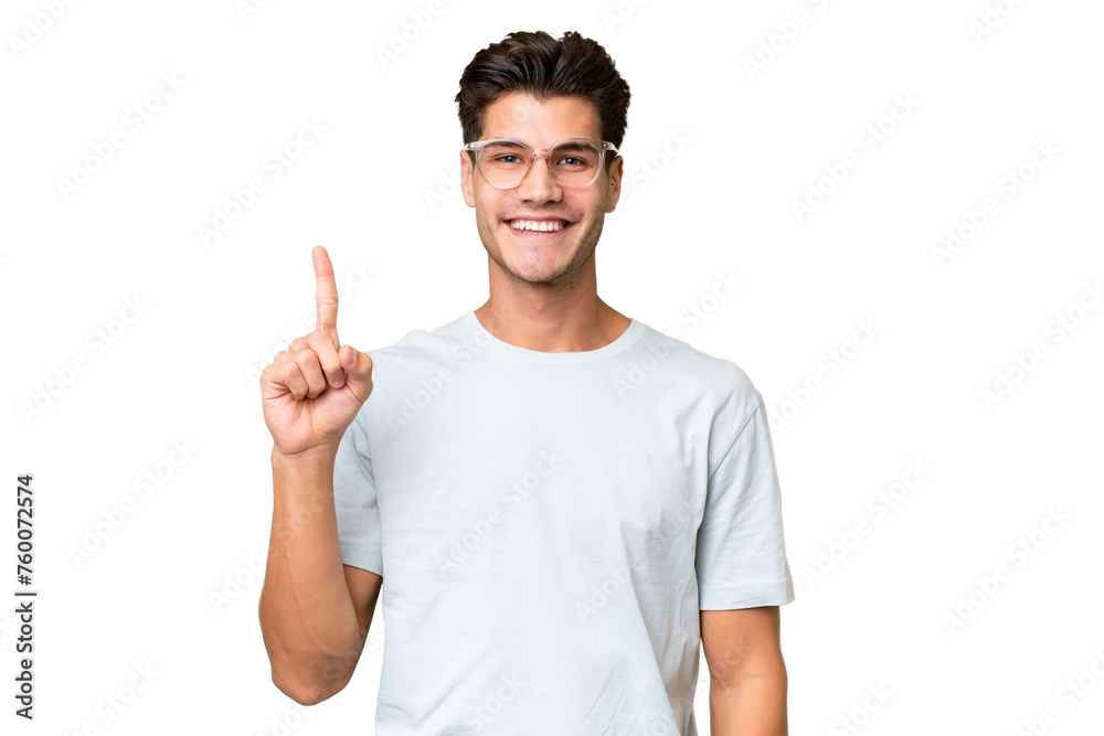 Young caucasian handsome man over isolated background pointing up a great idea Young caucasian handsome man over isolated background pointing up a great idea