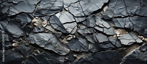 Texture, background, pattern. rugged slate rock surface photo