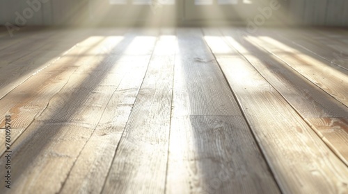 Sun-drenched wooden floorboards illuminate the room casting soft shadows, evoking a feeling of warmth and comfort © Gia