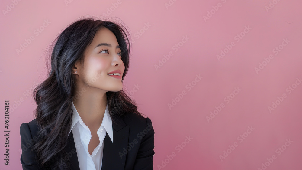 Malay businesswoman in black formal suit smiling isolated on pastel Malay businesswoman in black formal suit smiling isolated on pastel