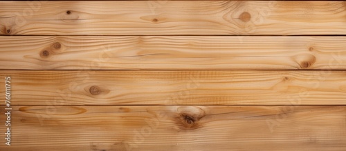 A closeup shot showcasing a brown wooden table made from ambercolored wood with a glossy varnish finish. The hardwood plank flooring in the background adds to the aesthetic