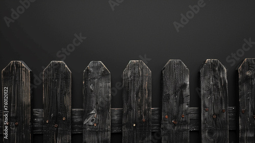 the black wooden fence on a dark background