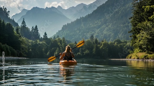 Obraz na płótnie Kayaking on the river with a view of the mountains and forests w salonie