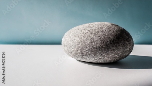 gray stone on white background with shadows free space for your deocration