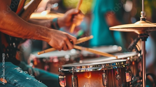 A close-up shot of a drummer in action during a live performance, filled with intensity and passion for music