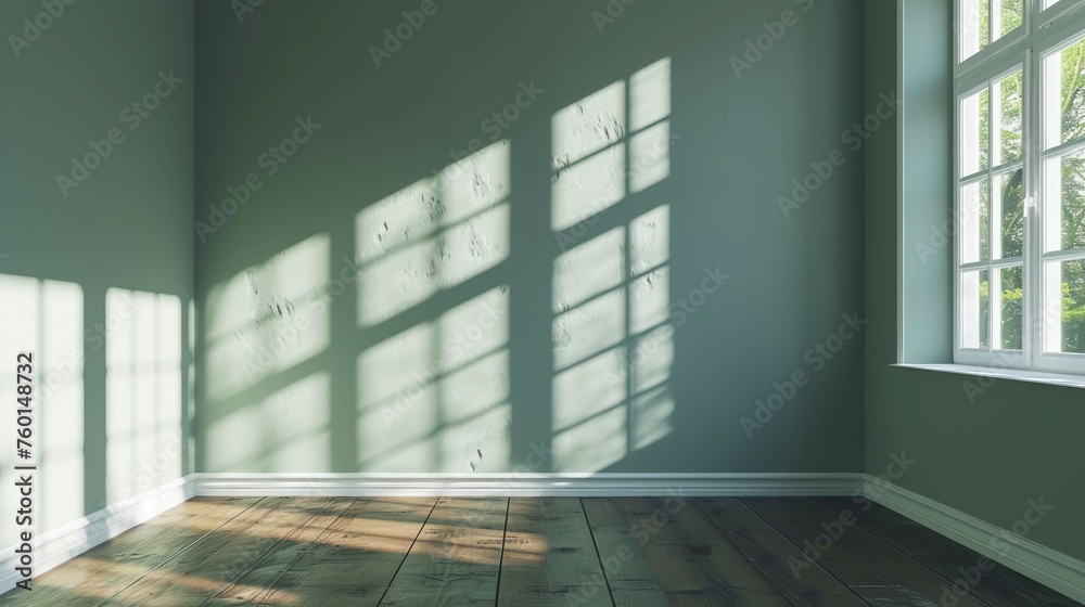 Fototapeta premium The play of light and shadow creates a geometric pattern across the walls of a room with green paint, offering a natural and peaceful atmosphere